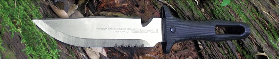 Nisaku field knife resting on moss